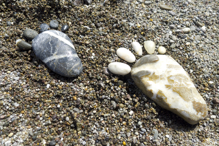 foot prints of stones on beach at the beautiful Greek Island, Lesvosの写真素材