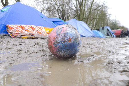 Dunkerque, France-24 January 2016: Refugee camp Grande-Synthe in France is a muddy camp with a lot of dirty waste. People are cold and hungry.のeditorial素材