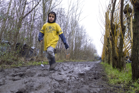 Dunkerque, France-23 January 2016: Refugee camp Grande-Synthe in France is a muddy camp with a lot...