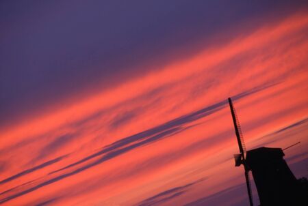 A beautifull windmill in landscape The Netherlandsの写真素材