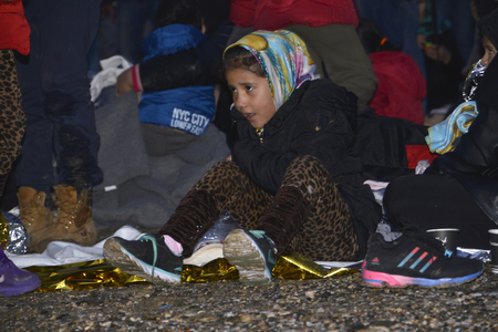 Mytilini, Lesvos, Greece, 25-February-2016: Early morning arrivals refugees at Lesvos. After they flee from their home country. They travel from Turkey to Greece to get to Europe.のeditorial素材