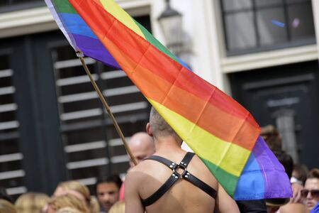 Amsterdam, Netherlands - August 1, 2015: participants in the annual event for the protection of human rights and civil equality - Gay Pride Parade on the Prinsengracht, Amsterdamのeditorial素材