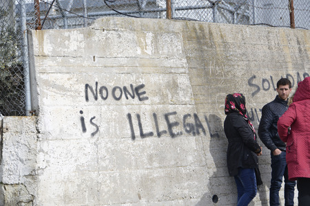 LESVOS, GREECE March 04, 2016: Words written by refugees and volunteers on walls at the Greek island Lesvos. Hotspot Moria, deportation center refugees.のeditorial素材