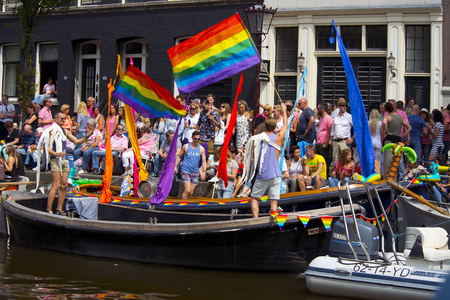 Amsterdam, Netherlands - August 1, 2015: participants in the annual event for the protection of human rights and civil equality - Gay Pride Parade on the Prinsengracht, Amsterdamのeditorial素材