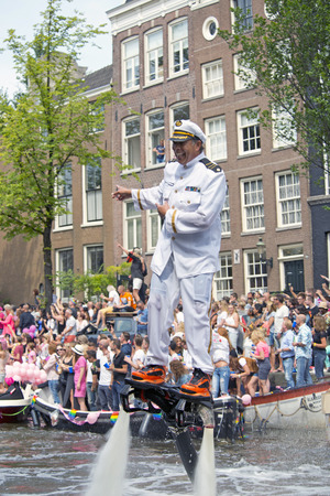 Amsterdam, Netherlands - August 1, 2015: participants in the annual event for the protection of human rights and civil equality - Gay Pride Parade on the Prinsengracht, Amsterdamのeditorial素材