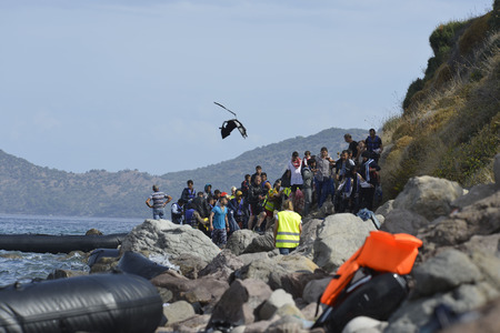 Lesvos, Greece- October 12, 2015, 2015. Refugee migrants, arrived on Lesvos in inflatable dinghy boats, they stay in refugee camps waiting for the ferry to mainland Greece continuing their journeys through Europe to seek asylum.のeditorial素材