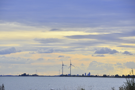 Windmills across the lake in the Netherlands