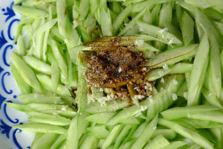 Sliced cucumber salad fresh from the gardenの写真素材