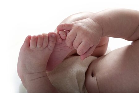 baby arms legs foot and hand isolated on a white background