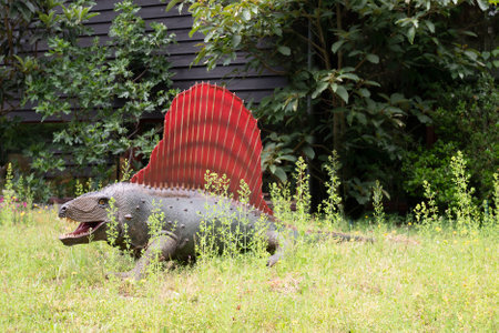 Dimetrodon Dinosaur in a green natural environment.