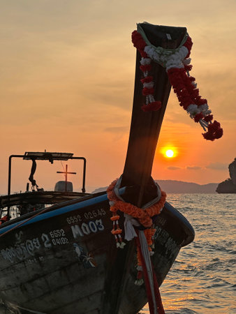 There is a boat featuring the number m003 visibly displayed on its sideの写真素材