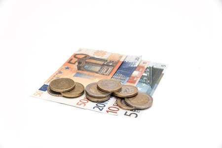 Euro coins and bills isolated