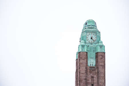 Clock tower isolated on white background, copyspace.の写真素材