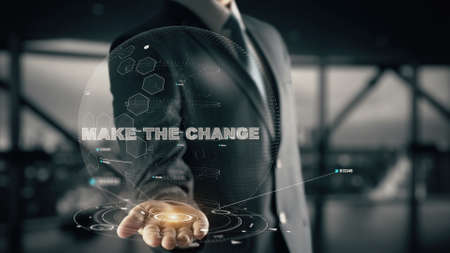 Make the Change with hologram businessman conceptの写真素材