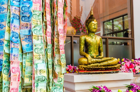 THAILAND, BANGKOK - NOVEMBER 6, 2014: Lottery Money on the street of Bangkok by one of the templesのeditorial素材