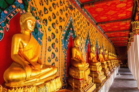 Golden Buddhist statues at Wat Suthat Temple, Bangkok, Thailandのeditorial素材