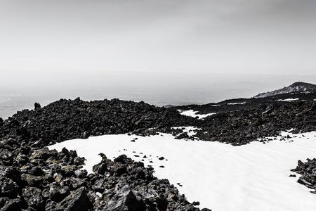 Etna mountain landscape, volcanic rock and snow, Sicily, Italyの写真素材