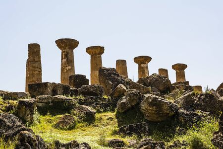 Ancient columns of Hercules Temple at Italy Sicily Agrigento. Greek Temples Valley.の写真素材