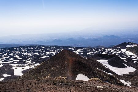 Etna mountain landscape, volcanic rock and snow, Sicily, Italyの写真素材
