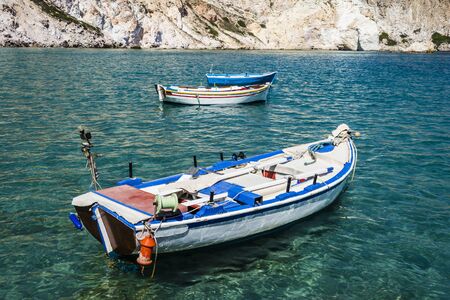 Traditional fishing boats at Milos island Greece