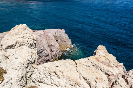Sea landscape made of white mineral formations on Milos island, at Greece