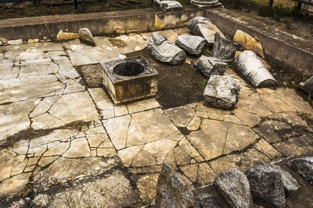 Ancient column ruins in the Dion Archaeological Site at Greeceの写真素材