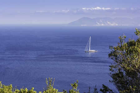 Sailboat in the sea. Summer season nature background.