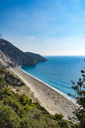Lefkada island, Mylos beach, Greece - August 30 2016: The sand is pure white and the waters are turquoise. The beach is at the end of the scenic footpath setting out from Aghios Nikitas.のeditorial素材