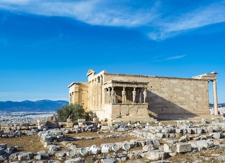 The Porch of the Caryatids at the Erechtheion temple on the Acropolis, Athens, Greece. Six columns sculpted as figures of maidens in place of ordinary columns.の写真素材
