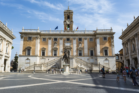 Tourists at Piazza del Campidoglio on top of Capitoline Hill and Palazzo Senatorio, Rome, Italy.のeditorial素材