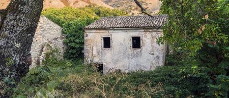 Old abandoned stone-built house in Old Perithia at Pantokrator Mountain, Corfu Island, Greece. Old Perithia is a ghost village on the northern side of Corfu.の写真素材