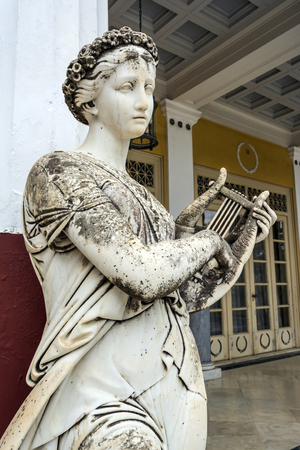 Achilleion palace, Corfu, Greece - August 24, 2018: Statue of a Greek mythical muse in the Achilleion palace in Corfu, Greeceのeditorial素材