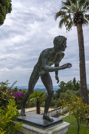 Achilleion palace, Corfu, Greece - August 24, 2018: Bronze runner on Achilleion palace of princess Sissy in Corfu, Greeceのeditorial素材