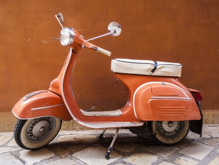 Corfu, Greece - August 25, 2018: Vespa scooter on Corfu street Greeceのeditorial素材