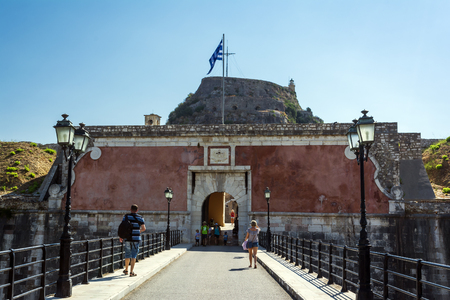 Corfu, Greece - August 25, 2018: Fortezza Vecchia (Old Fortress, Corfu) entrance with tourists on the bridge.のeditorial素材