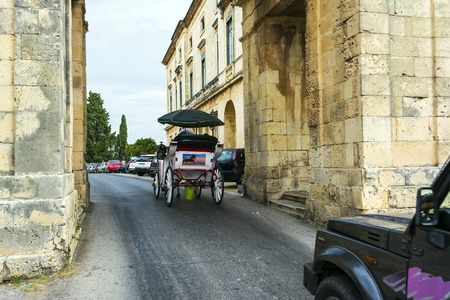 Decorated horse carriage that offer a unique tour around Corfu town.