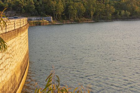 Lake Marathon and dam on a autumn evening, Attica, Greece.の写真素材