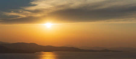 Beautiful sunset over Aegean Sea in Pelion Peninsula, Greece.の写真素材