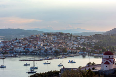 Beautiful view of Ermioni sea lagoon with moored yachts and boats at sunset time. Travel by Greece.の写真素材