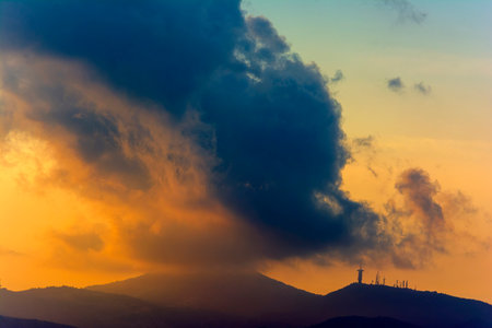 Cloudy sky and sunset light. Penteli, Greece.の写真素材