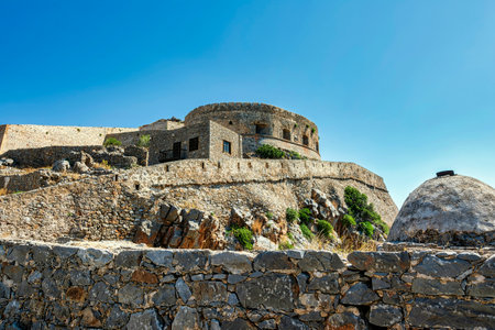 Round tower of Spinalonga fortress. Crete, Greece. Until 1957 used as a leper station, now it is a popular tourist destination.の写真素材
