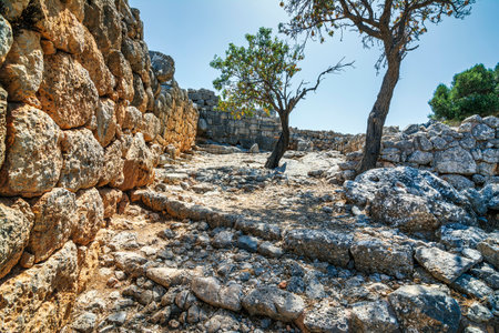 Ruins of the ancient Greek city of Lato,2500 years old near Kritsa, Crete. Lato was one of Crete's most important Dorian city-states, considered the most well-preserved city of the classical Hellenistic period. Built between two hills, in a strategic location, offers defensive coverage to the entire city.の写真素材