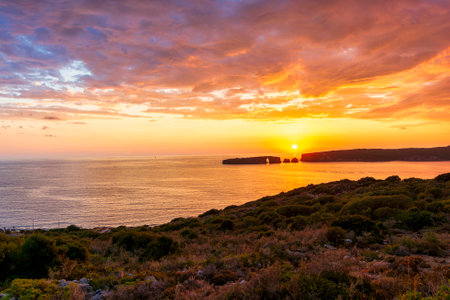 Sunset at the island of Sfaktiria near the town of Pylos in Peloponnese, Greece.の写真素材