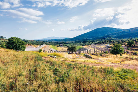 Ancient Greek Stadium in Ancient Messini in Greece. Ancient Messini was founded in 371 BC after the Theban general Epaminondas defeated Sparta at the Battle of Leuctra, freeing the Messinians from almost 350 years of Spartan rule.の写真素材