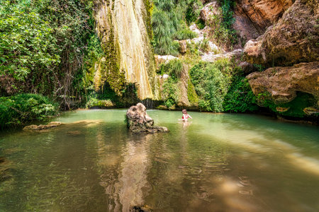 Waterfall of Kalamaris, a natural reserve in Gialova region, Messinia prefecture, Peloponnese, Greece, Europe. It is a small wetland with many amphibians and insects living in its waters.の写真素材