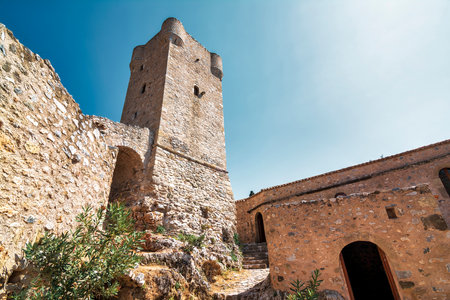 Kardamili old town, Messenia, Greece. Old Kardamili is a small collection of abandoned fortified tower-houses clustered around a beautiful 18th century church in Messenia Peloponnese Greece.の写真素材