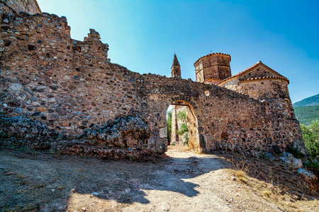 Kardamili old town, Messenia, Greece. Old Kardamili is a small collection of abandoned fortified tower-houses clustered around a beautiful 18th century church in Messenia Peloponnese Greece.の写真素材