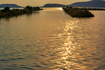 Sunset at the gialova lagoon. The gialova lagoon is one of the most important wetlands in Europe. Greece.の写真素材