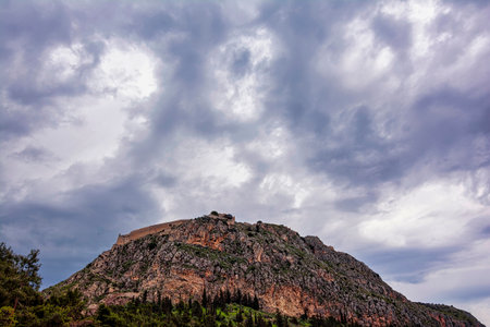 The historical Palamidi fortress against an overcast sky, in Nafplio city, Argolis, Greece. The fortress was built by the Venetians.の写真素材
