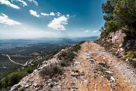 Penteli mountain country road at Attica, Greece. Situated north of Athens city center, mount Penteli is famous for its white marble, which was used to build the Acropolis.の写真素材